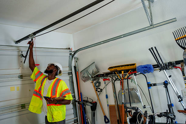 Professional Garage Door Panel Replacement technician working in Stinnett, TX
